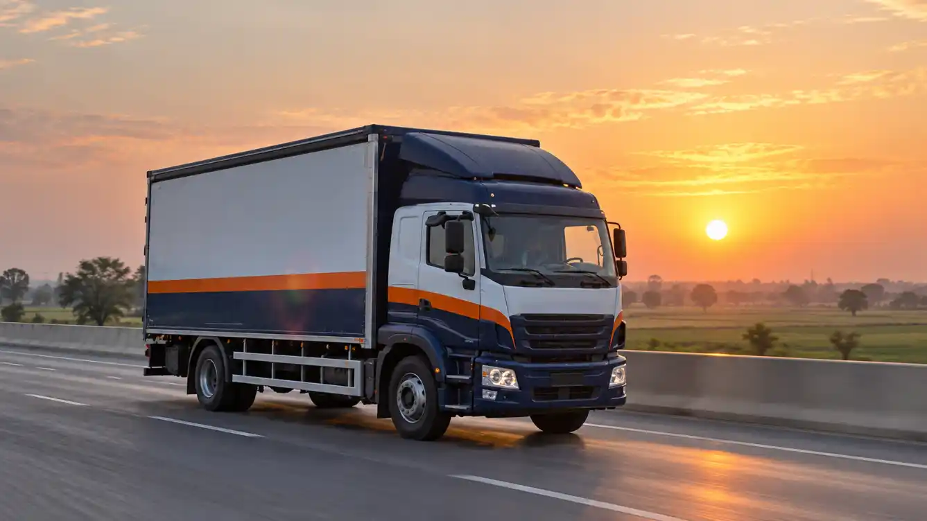 Covered moving truck on the motorway during an intercity move